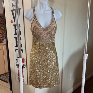 Elegant Gold Sequin Mini Dress